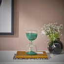 EFTERTANKA Decorative hourglass, clear glass/green, 15 cm